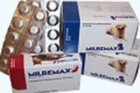 Boîtes de Milpro chien et plaquettes de comprimés.